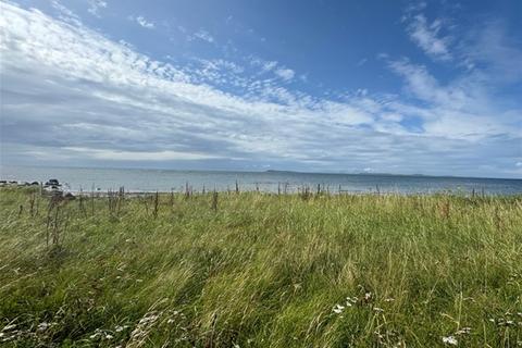 Land for sale, Muasdale