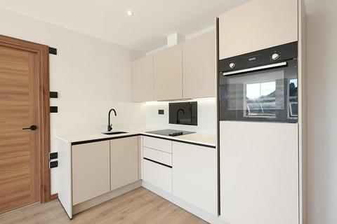 Flat 1, Bridge House, 27 Bridge Street, Leatherhead, KT22 8HE