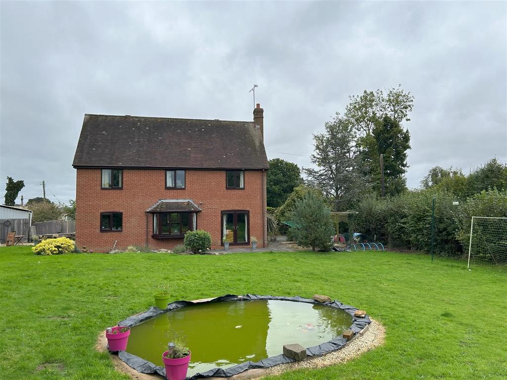 Rear w pond.jpg