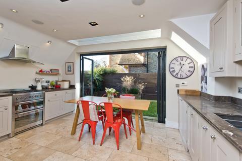 4 bedroom house to rent, Strachan Place, London SW19
