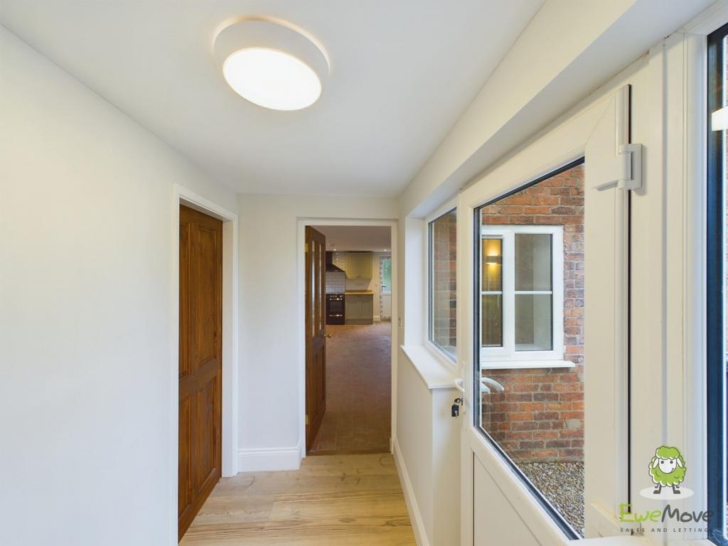 Rear hallway into kitchen