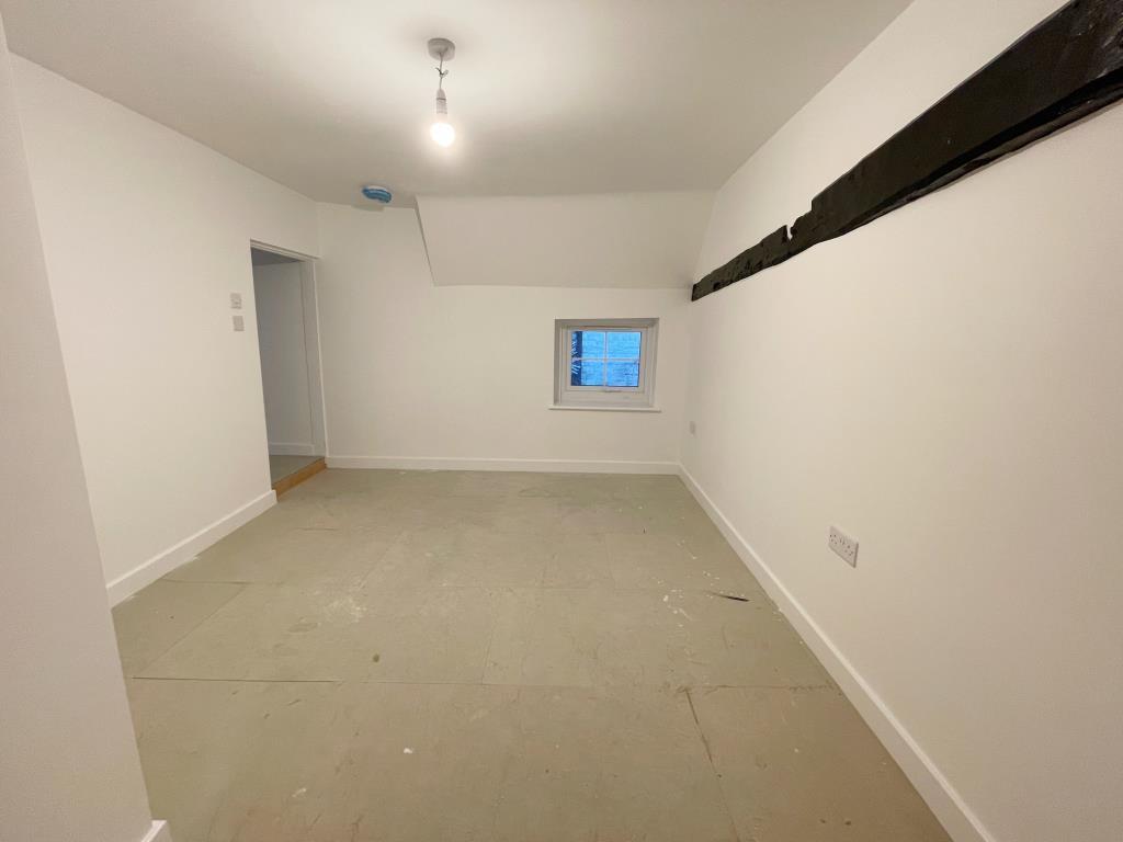Bedroom in Flat B with access to en-suite shower r