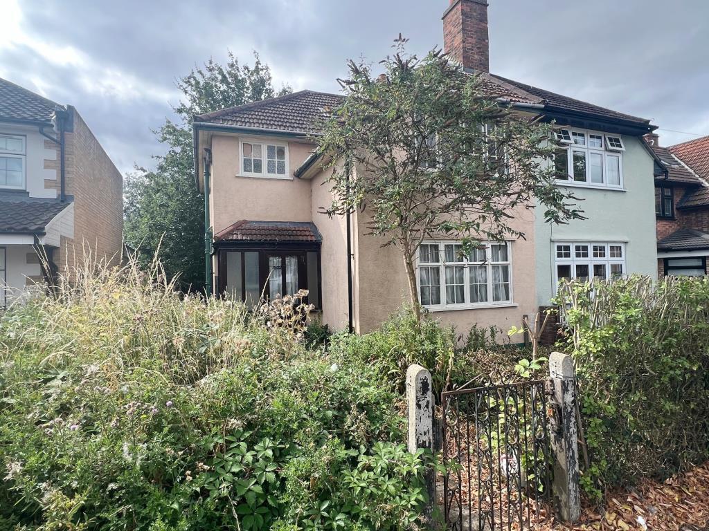 Front garden with path leading to entrance door