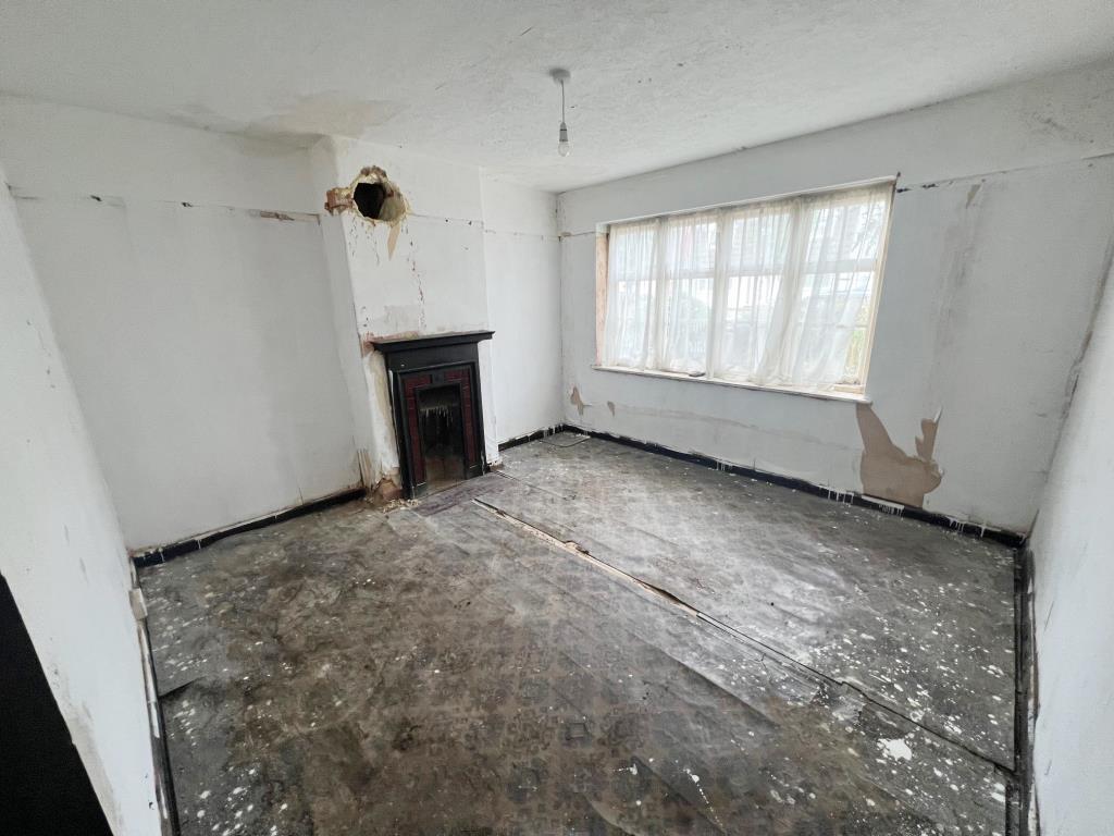 Reception room with window to front aspect