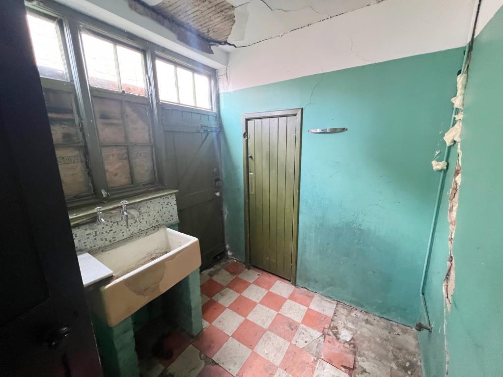 Space for kitchen with currently just a sink fitte