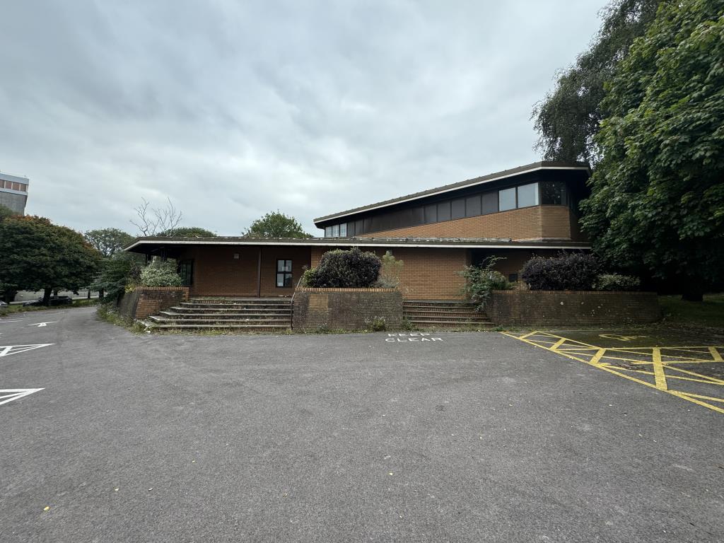 View of the front of the building from the car par