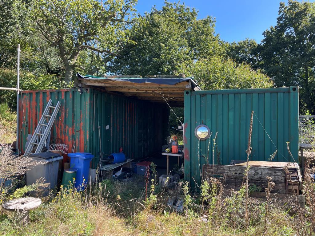 Storage containers on rear section of site