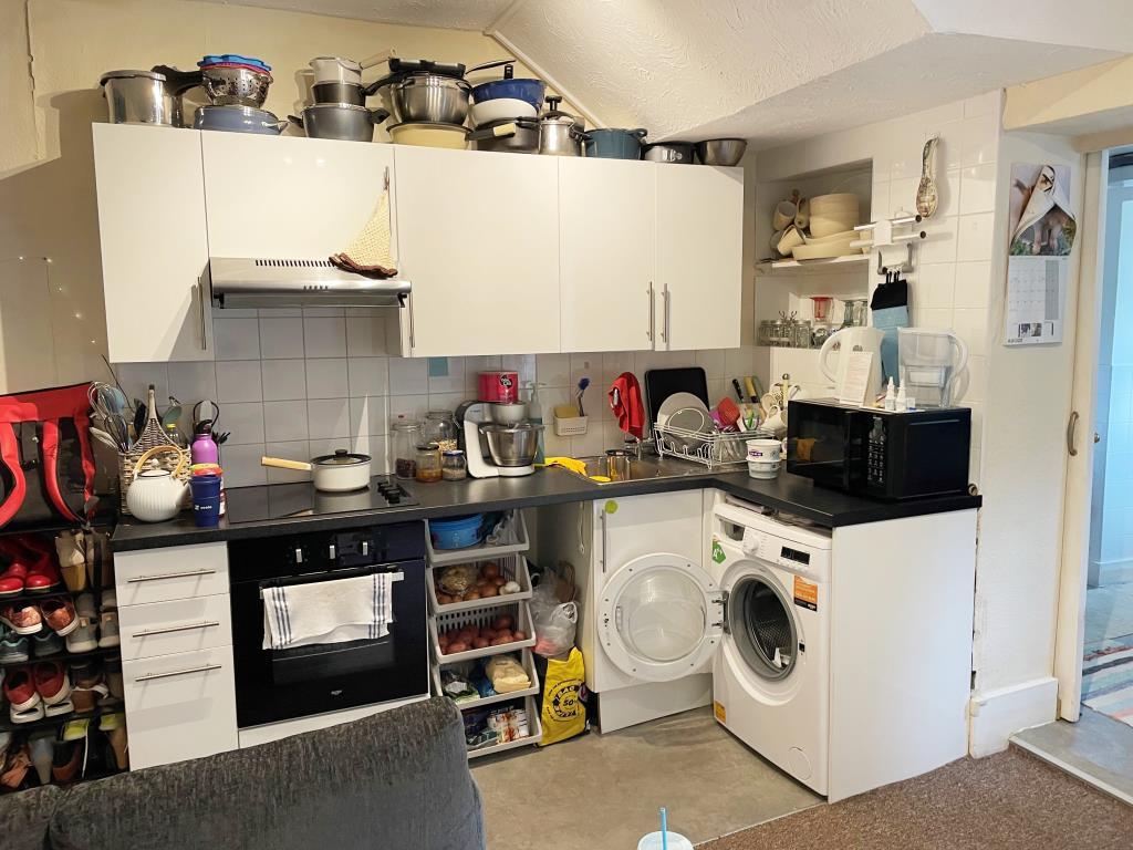 Open plan kitchen with fitted units