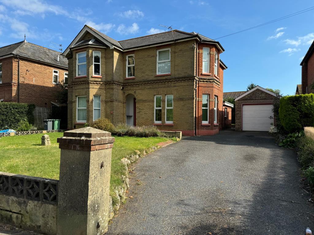 Detached building with garden to front and drivewa