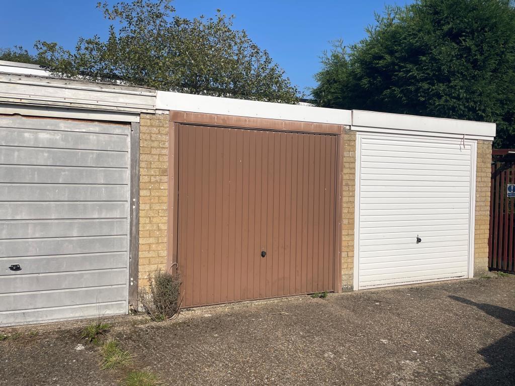 Lock up garage with up and over door.