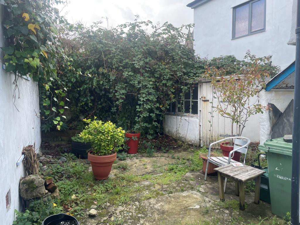 Rear courtyard with outbuilding
