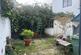 Rear courtyard with outbuilding