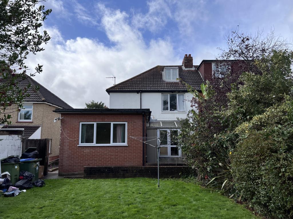 Rear of house looking from garden showing extensio