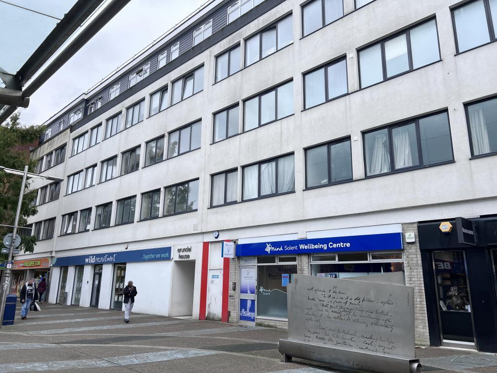 Front of building with flats above commercial unit