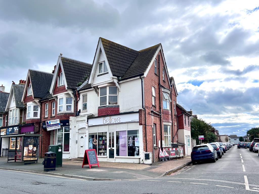 First floor studio flat above beauty shop