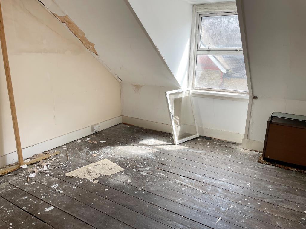 Attic bedroom with dormer window