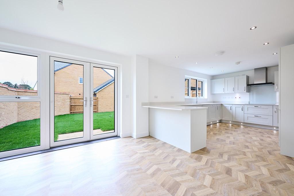 The timeless kitchen is a generous size with...