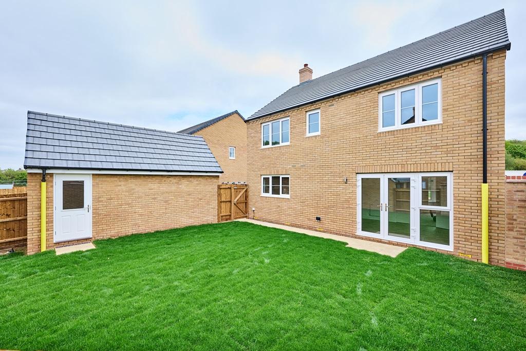 The turfed, west facing garden
