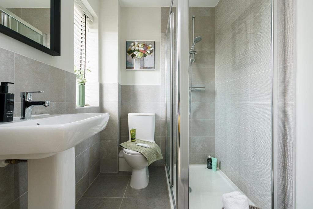 The main bedroom boasts its own en suite shower...