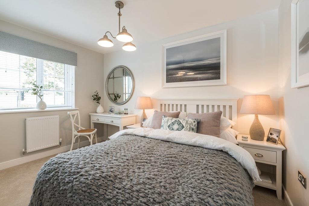 A double bedroom with built in wardrobes