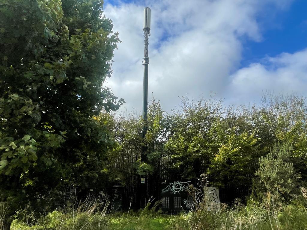 Communication mast on site