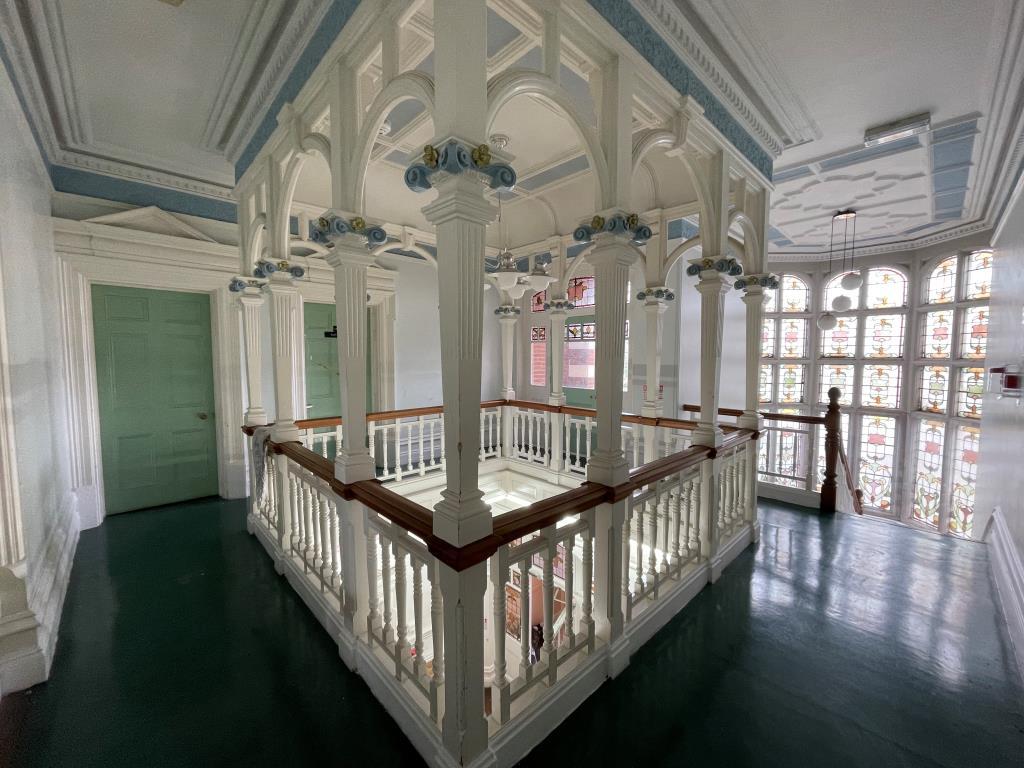 Gallery Landing and stained glass window