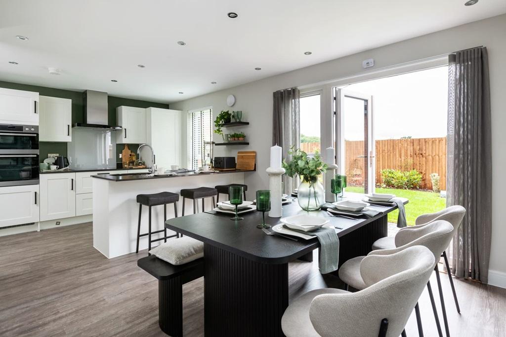 The kitchen covers the rear of the home