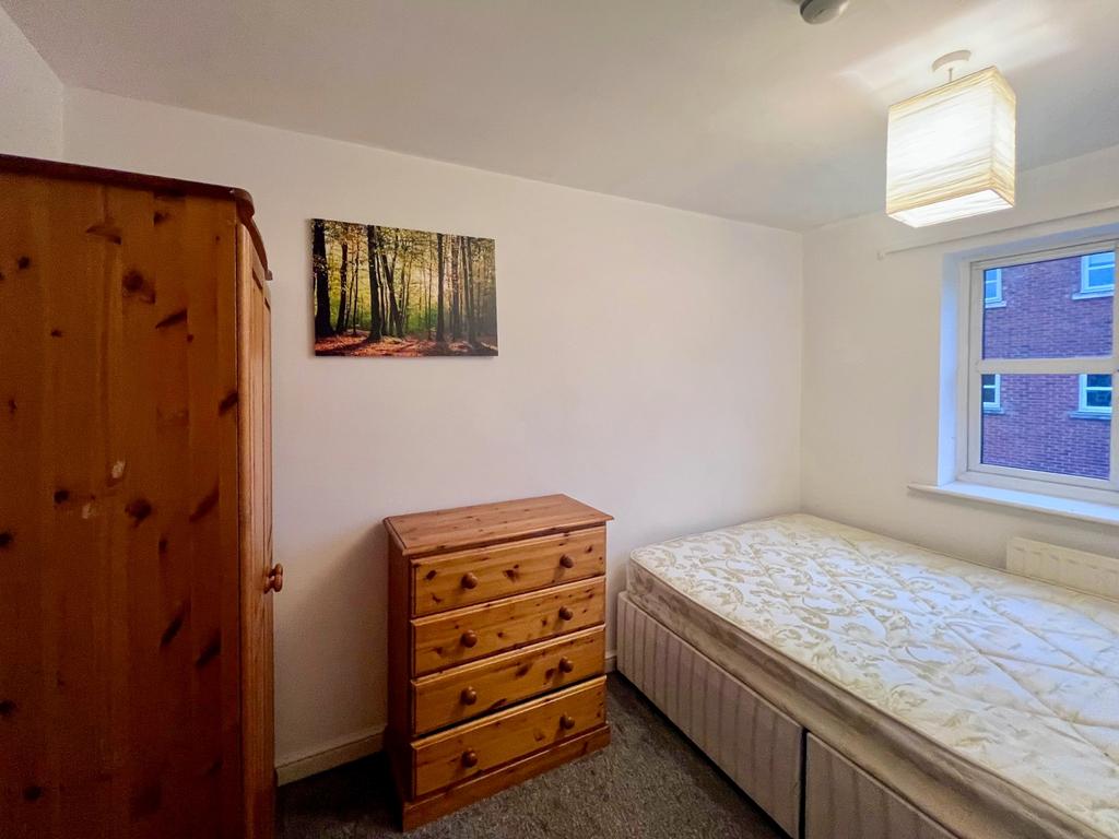 2nd floor bedroom to front of house