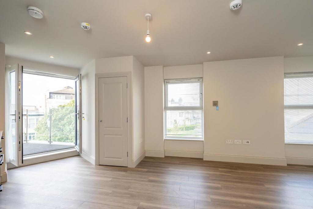 Dining Area and Balcony.jpg