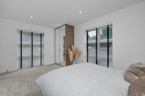1 Ditton Grove, Esher, KT10 9FN