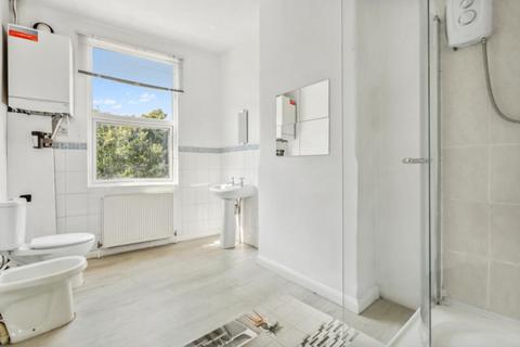 33 Russell Gardens Mews, London, W14 8EU