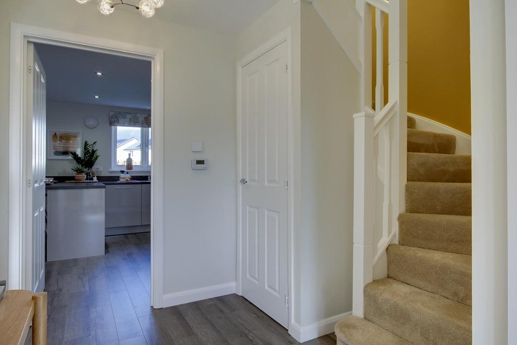 Bright hallway with under stair storage