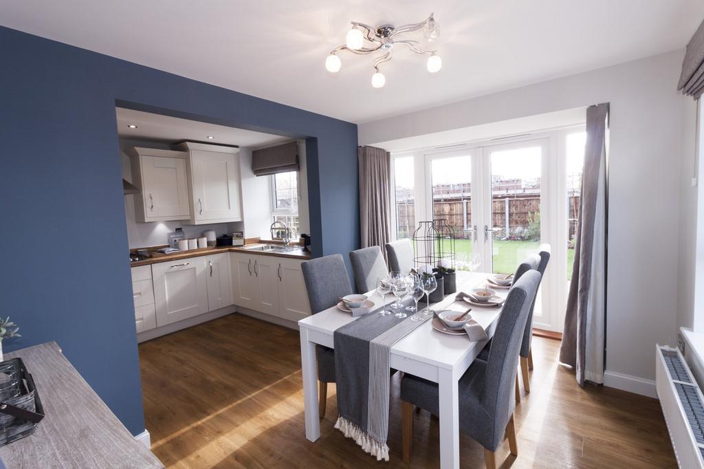 Kitchen and dining area with glazed bay/French...