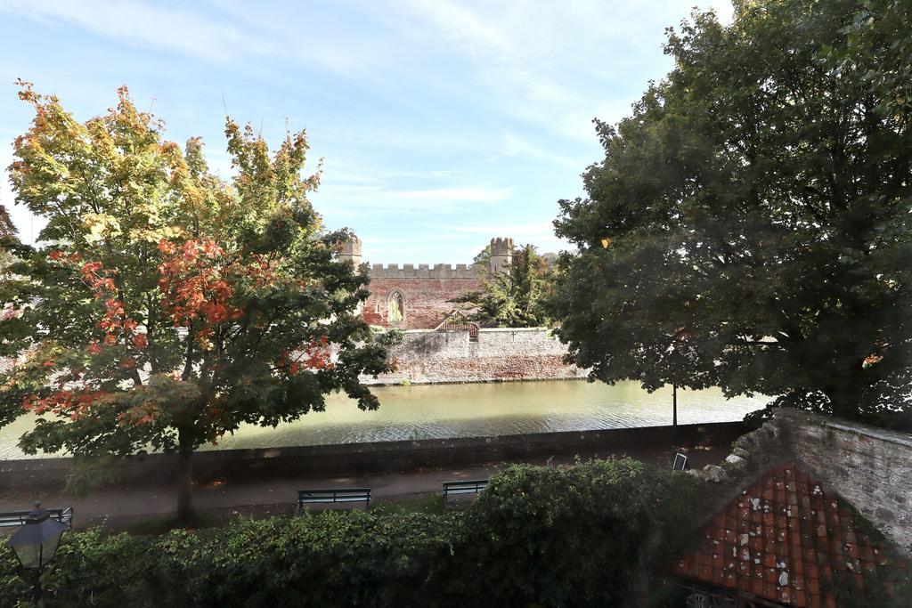 View to the Bishops Palace and moat from the sitti