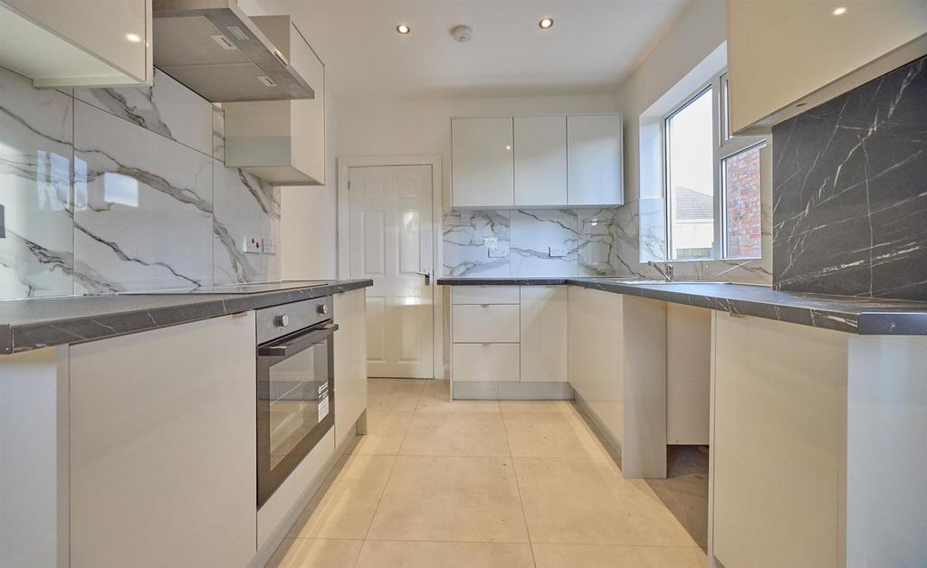 Refitted kitchen to rear