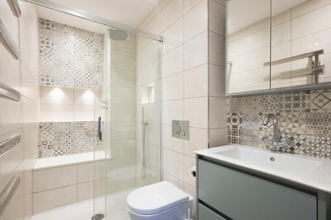 36 Pine Grove, London, SW19 7HE
