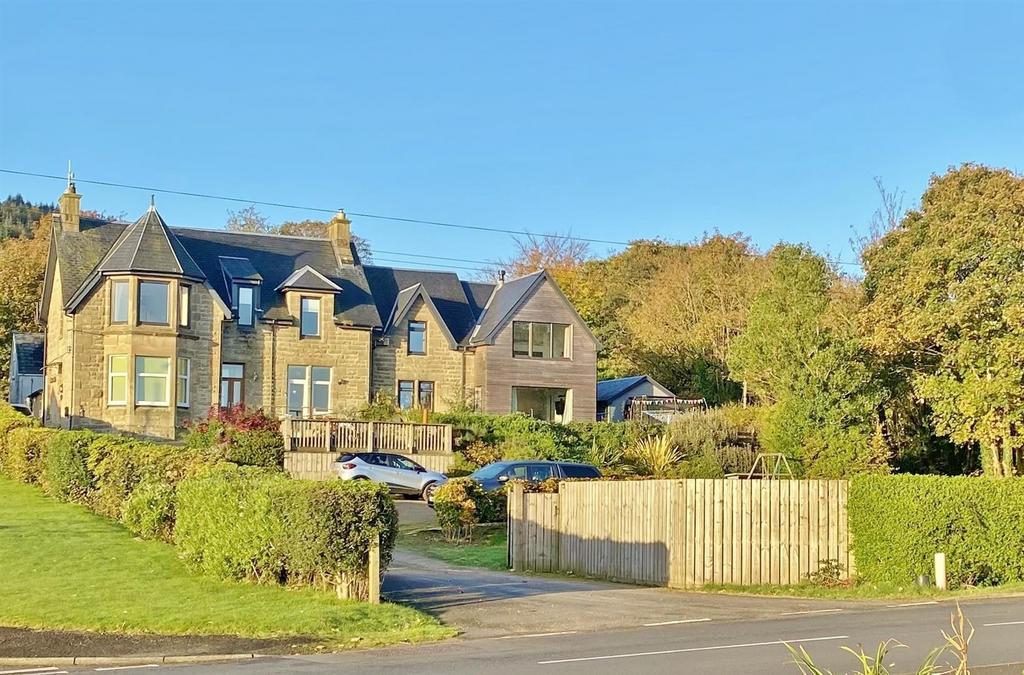 From the road side, driveway and parking