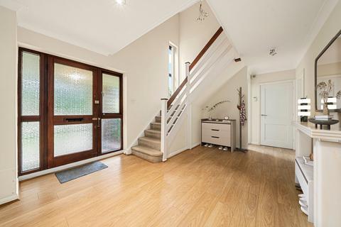 11 Beechwood Drive, Cobham, KT11 2DX