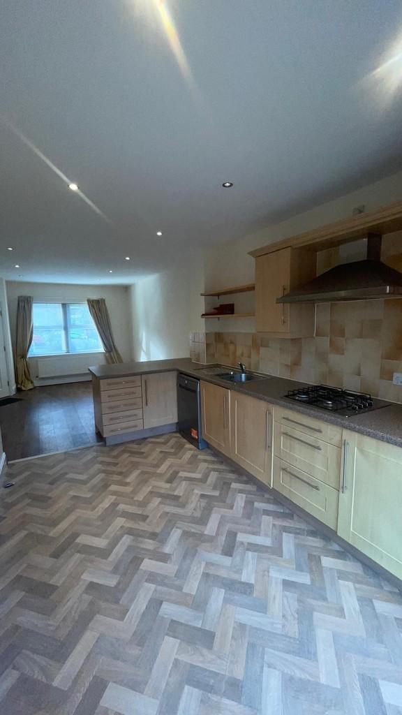 Kitchen looking onto lounge