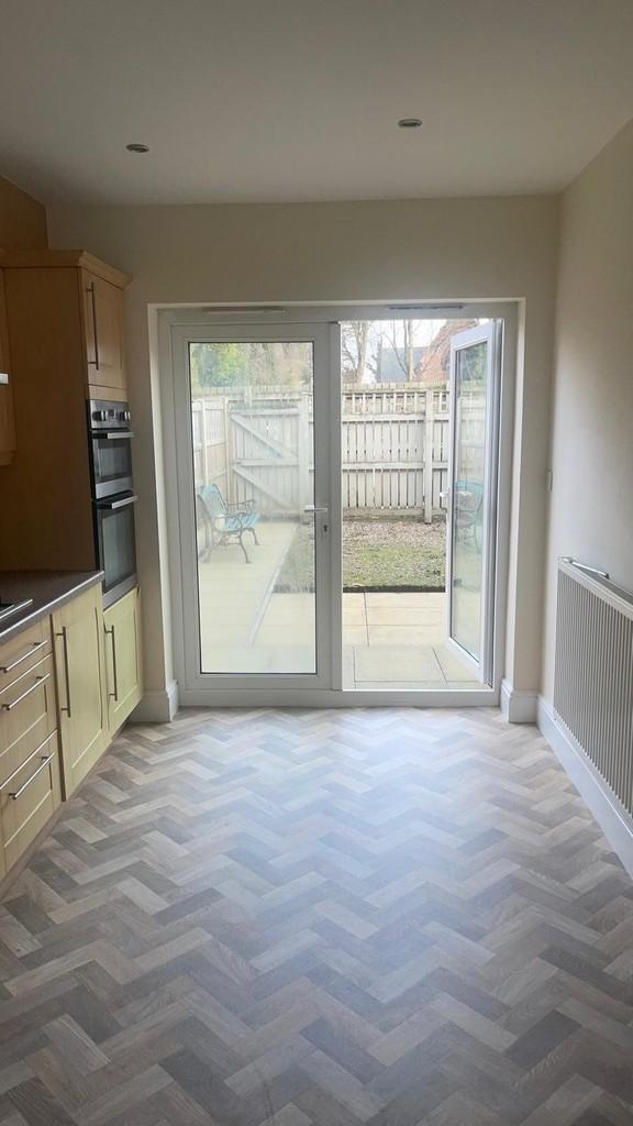 Kitchen leading outside