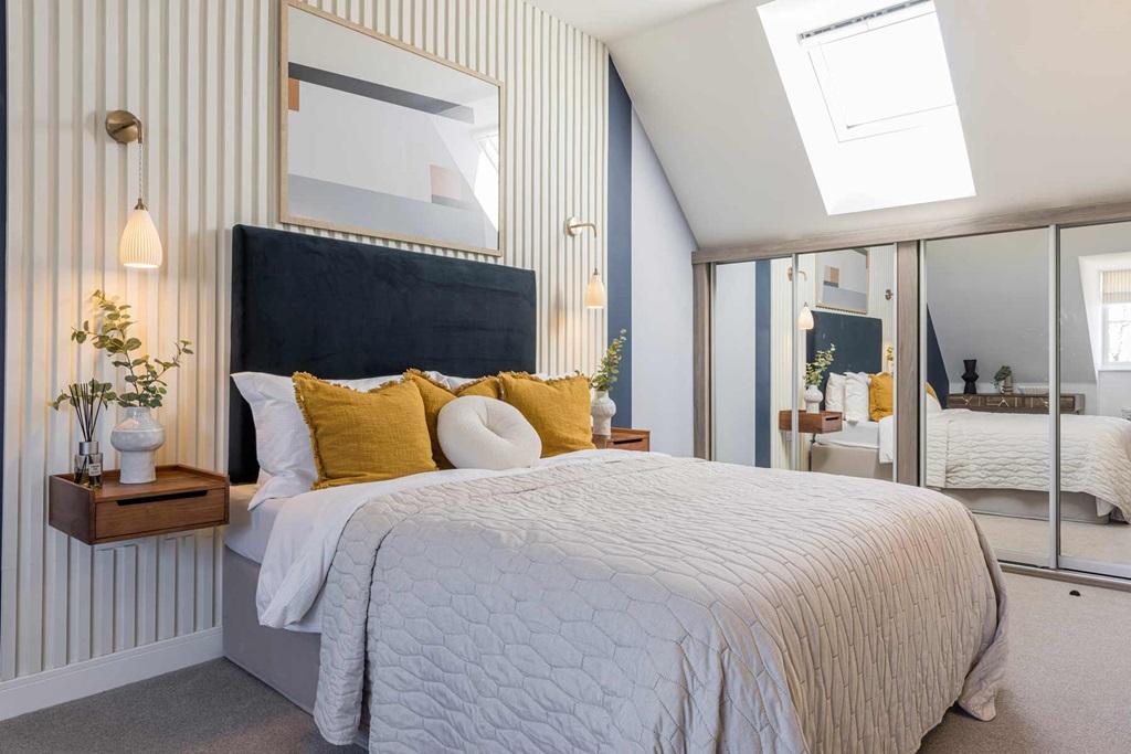 Enjoy privacy in the main bedroom on the second...