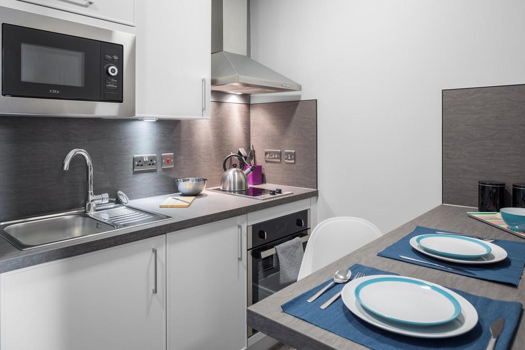 Kitchen area with breakfast bar