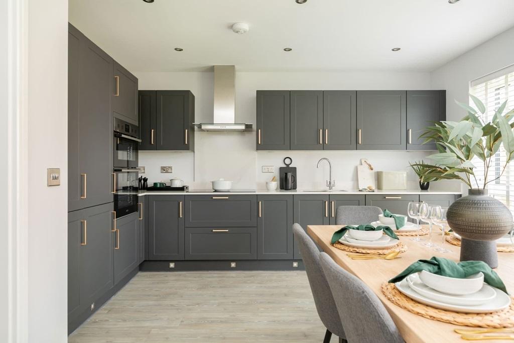 A modern kitchen &amp; dining area with ample storage