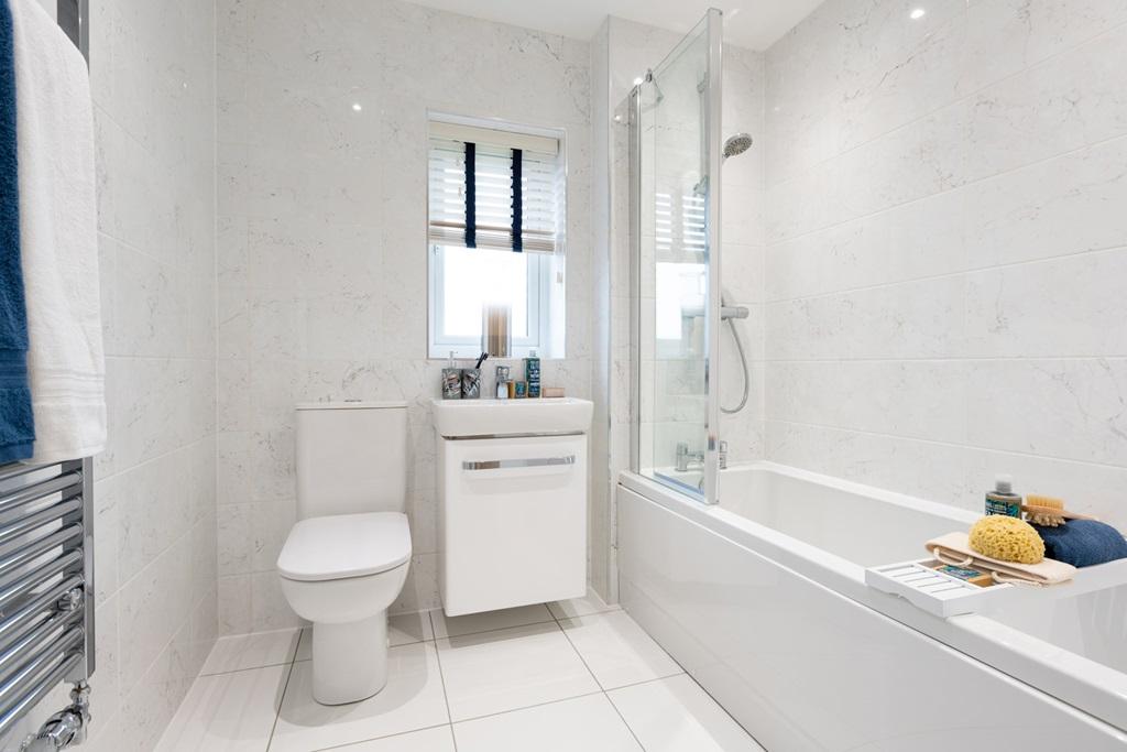 The family bathroom is bright and spacious