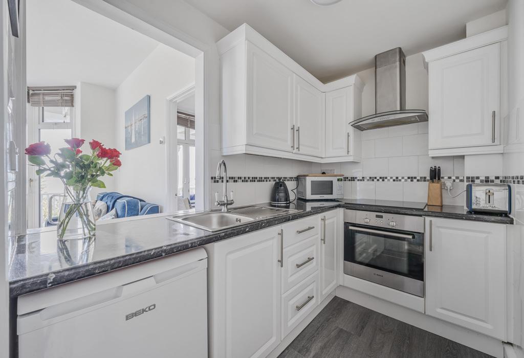 Kitchen looking onto lounge/diner