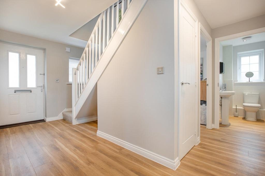 Bright hallway with under stair storage