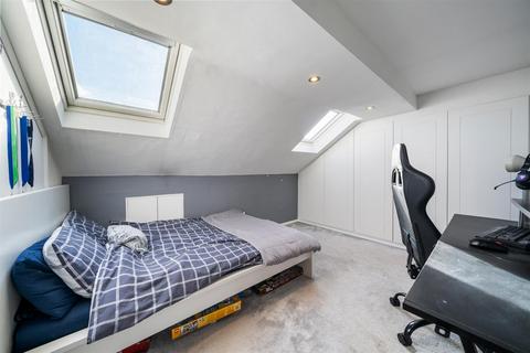 50 Abbott Avenue, London, SW20 8SQ