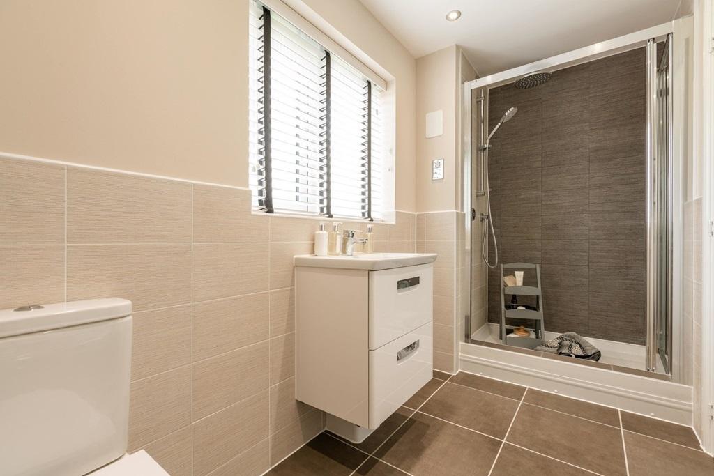 En-suite shower room away from the family