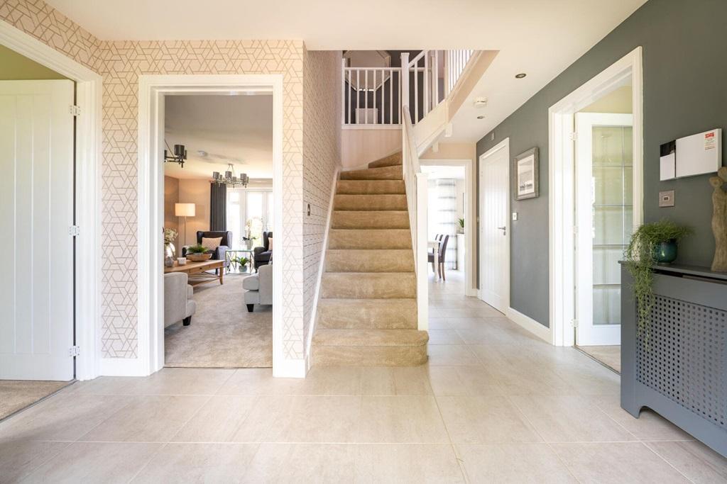 A welcoming hallway with central staircase