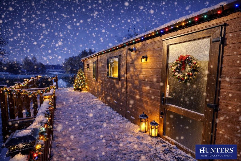 Christmas cabin by the lakeside.png